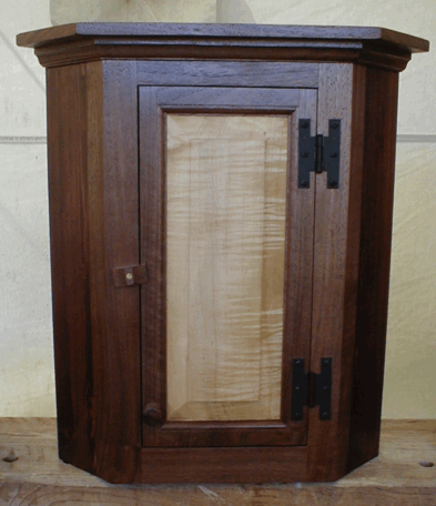 Walnut and Maple Corner Cabinet (click to enlarge)